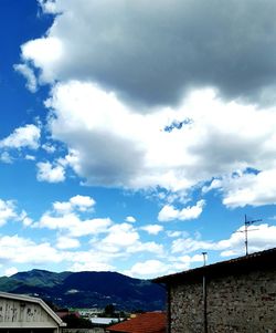 Clouds over mountain range