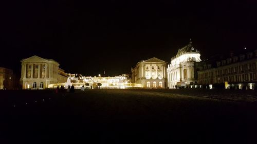 Facade of historical building at night