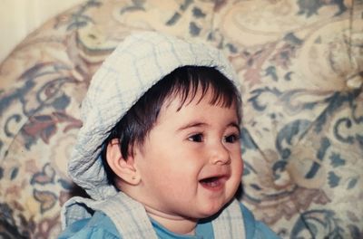 Close-up of cute baby boy wearing hat