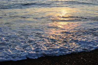 High angle view of waves on beach
