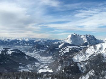 Scenic view of snowcapped mountains against sky