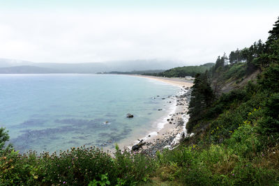 High angle view of bay against sky