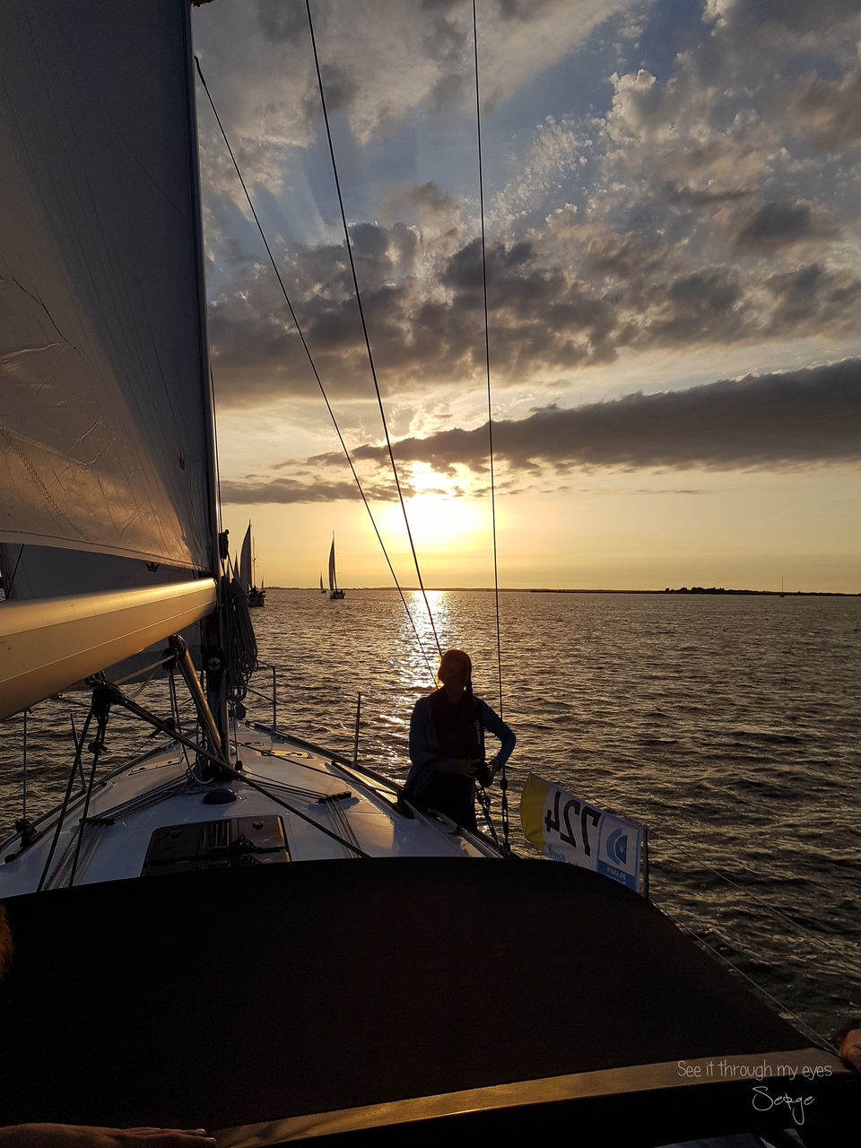 nautical vessel, water, sky, sea, mode of transportation, transportation, sunset, cloud - sky, sailing, nature, beauty in nature, real people, scenics - nature, sailboat, horizon, men, horizon over water, leisure activity, silhouette, outdoors, luxury