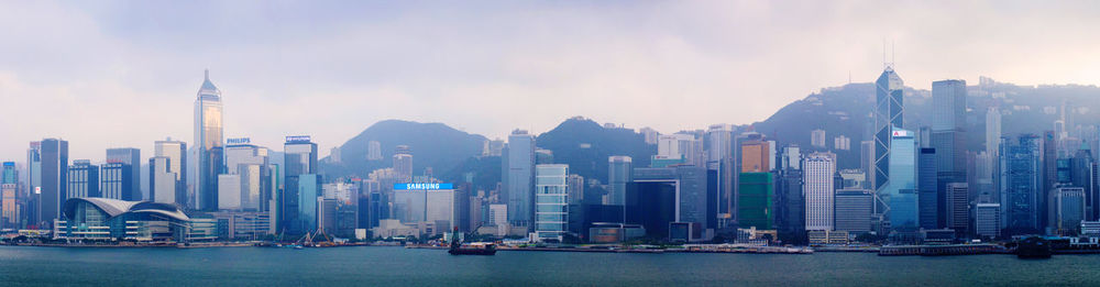 Panoramic view of city buildings against sky