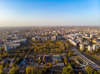 High angle view of illuminated cityscape against sky