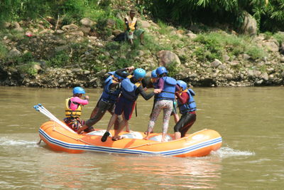 People on boat in water