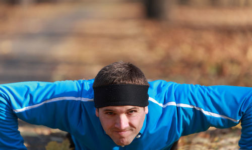 Man exercising at public park