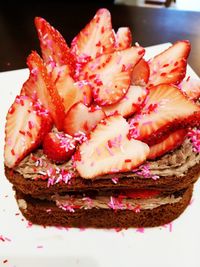 Close-up of strawberry on cake