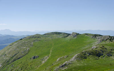 Scenic view of mountains against clear sky