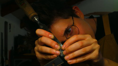 Cropped image of woman holding hair