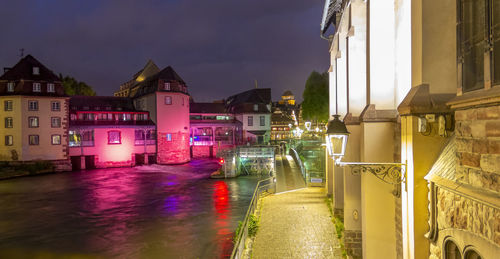 Buildings in city at night