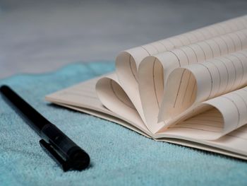 Close-up of open book on table