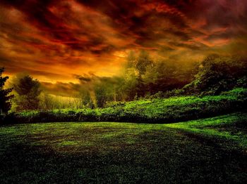 Scenic view of landscape against cloudy sky