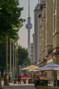 View of communications tower in city