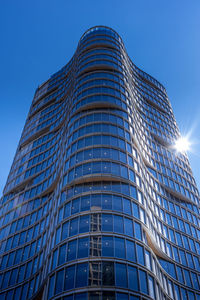 Low angle view of modern building against clear sky in vancouver