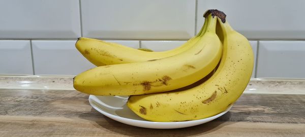Close-up of yellow fruits on table