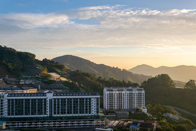 View of townscape against sky during sunset