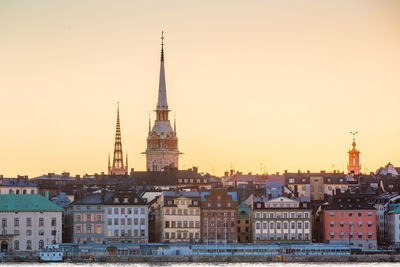 German church in town by riddarfjarden during sunset