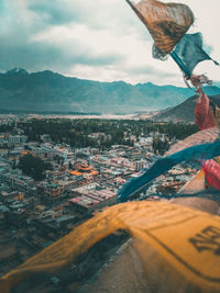 High angle view of city buildings against sky