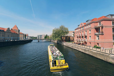 High angle view of bridge over river in city against sky