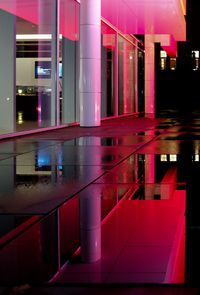 Illuminated buildings in city at night