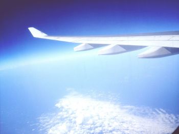 Cropped image of airplane wing