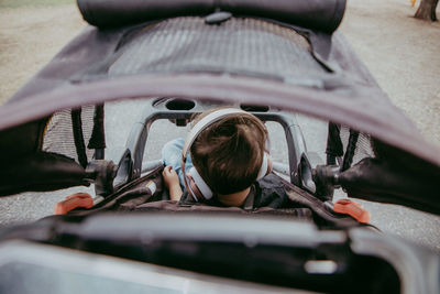 Baby in stroller with headphones