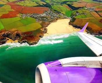 High angle view of sea seen through airplane window