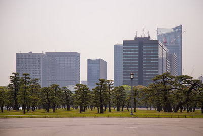 Exterior of modern buildings against clear sky