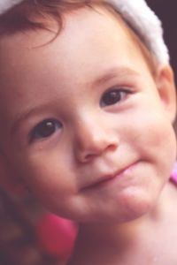 Close-up portrait of smiling boy