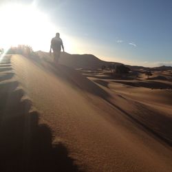 Woman standing on mountain landscape