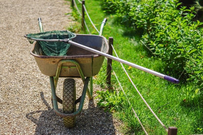 Gardener equipment - wheel barrow and scoop net