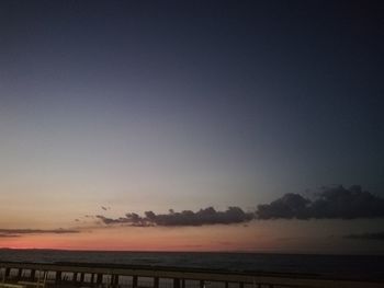 Scenic view of sea against sky at sunset