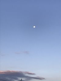 Low angle view of moon in sky