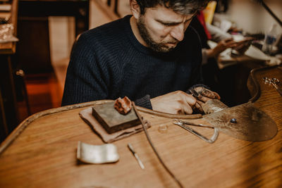 Man working on table