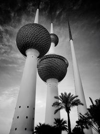 Low angle view of kuwait towers against sky in city