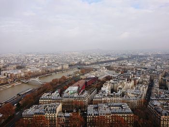 High angle view of buildings in city against sky