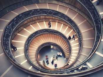 High angle view of people on spiral staircase