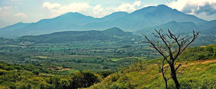 Scenic view of mountains against sky