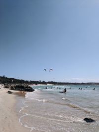 Scenic view of beach against clear sky