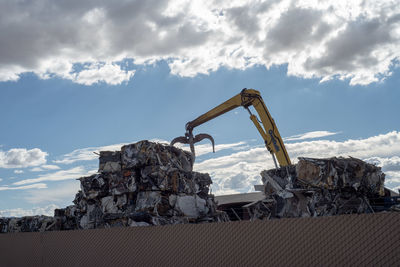 Low angle view of construction site against sky