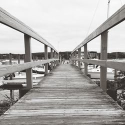 Footbridge against sky