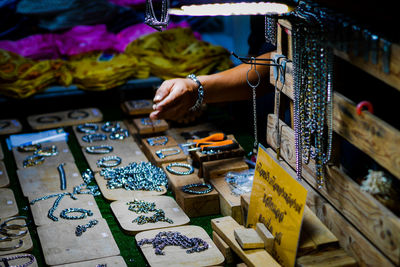 Cropped hand of person at market stall