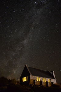 Low angle view of building against sky at night