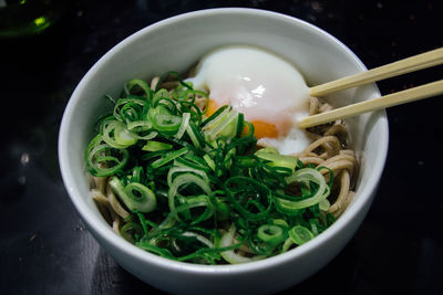 Close-up of soba noodles in bowl in table