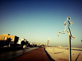 View of street light against blue sky