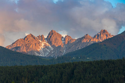 Scenic view of landscape and mountains against sky