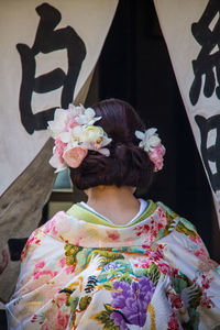 Rear view of woman wearing kimono