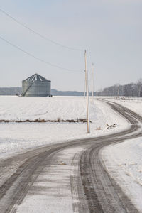 Empty road against sky