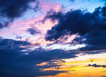 Low angle view of dramatic sky during sunset